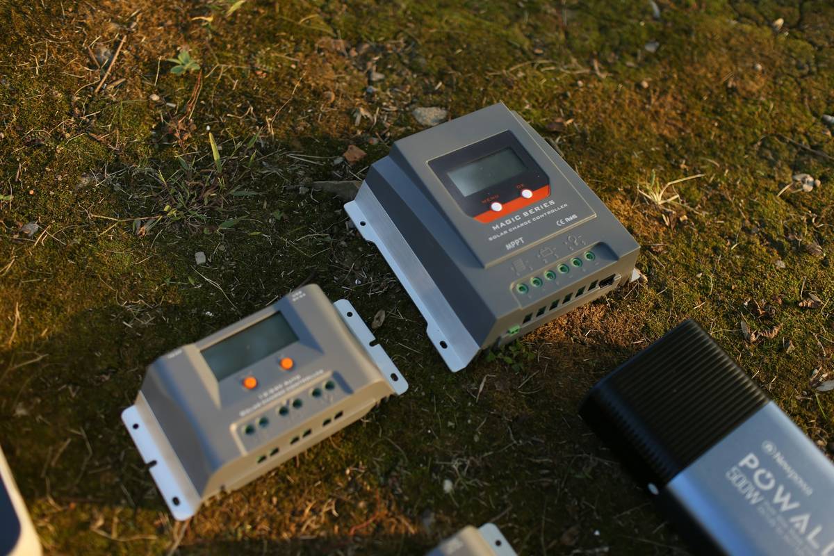 a couple of handheld game consoles